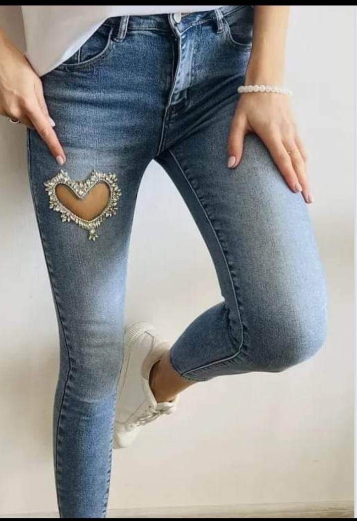 Spodnie damskie  duże jeans Roz 29-38 .  Paczka 10szt