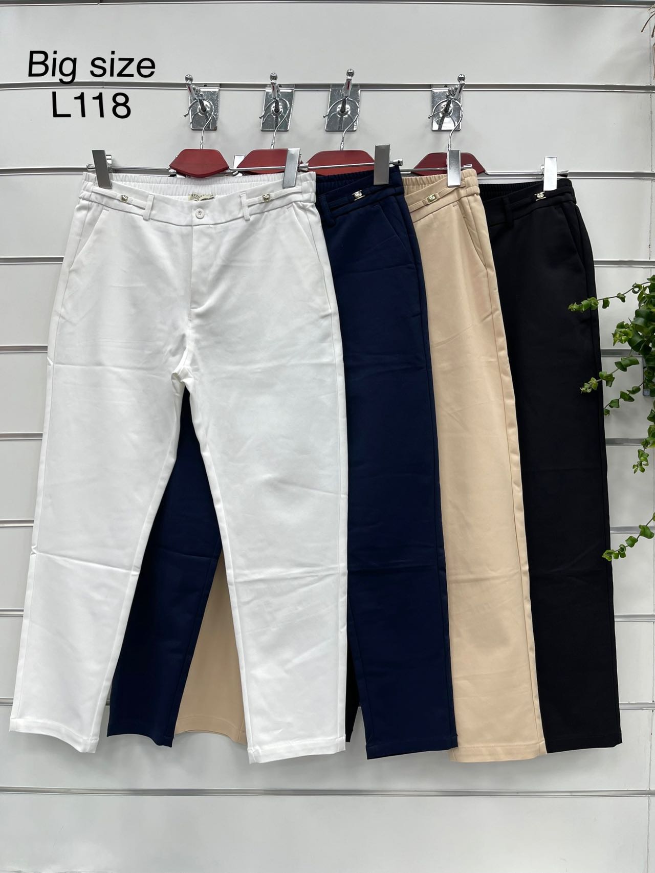 Spodnie  damskie materiałowe   Roz XL-4XL.  1 kolor . Paczka 8szt