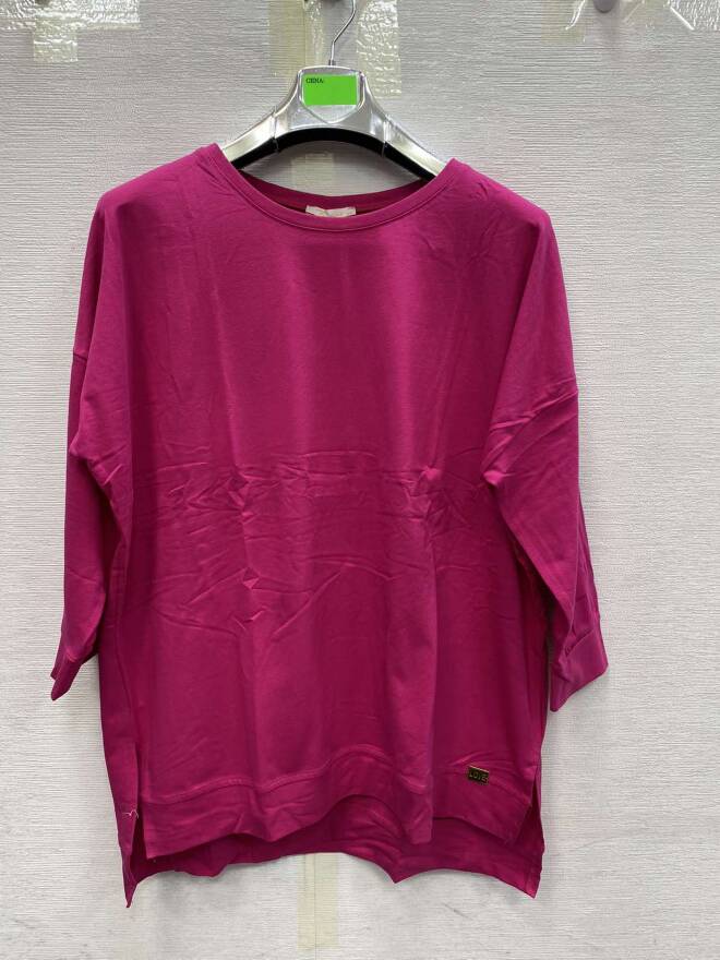 Bluzka damska .Roz M-2XL . 1 kolor Paczka 12 szt